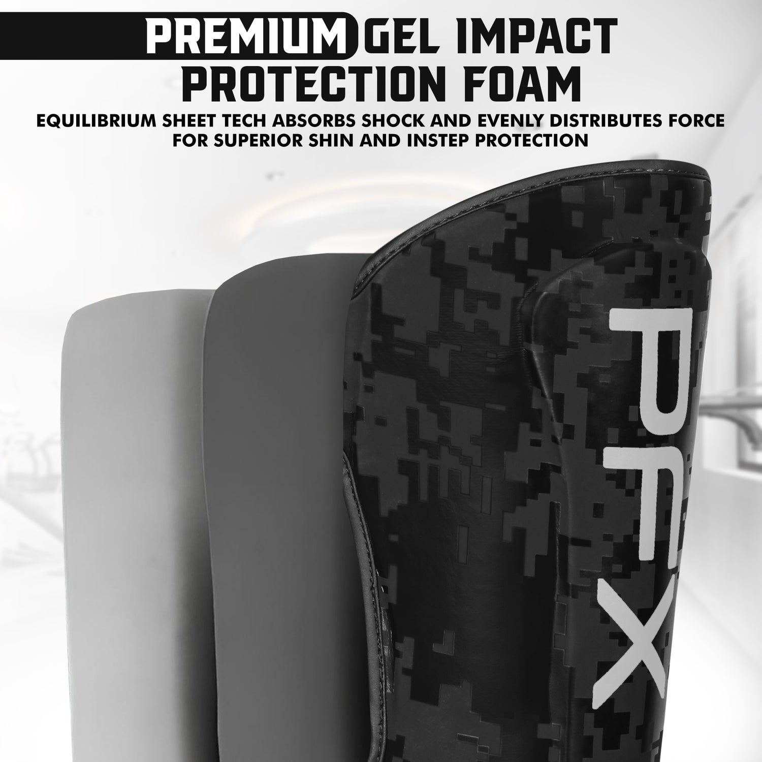 Detail of PFX shin guard's Dual Quick EZ Hook-and-Loop closures and non-slip lining, emphasizing secure and adjustable fit.